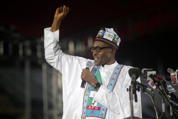 FILE: Presidential aspirant and former Nigerian military ruler Buhari speaks as he presents his manifesto at All Progressives Congress party convention in Lagos