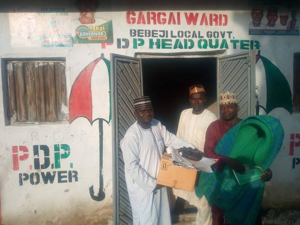 Local party leaders who chose to defect to APC with Shekarau packing their belonging from the party office at Gargai Ward in Bebeji Local Government Area of Kano State.