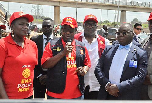 From left: Past District Governor/ Zonal Coordinator for Africa End Polio Now, Ijeoma Pesu Okoro; Rotary International Polio Ambassador in Africa, Sir Emeka Offor; and the District Governor 2019-2020 Rotary International District 9125, Victor Onukwugha at the unveiling of Special Polio Billboard to mark the World Polio Day along Airport Road at Lugbe in Abuja on Wednesday