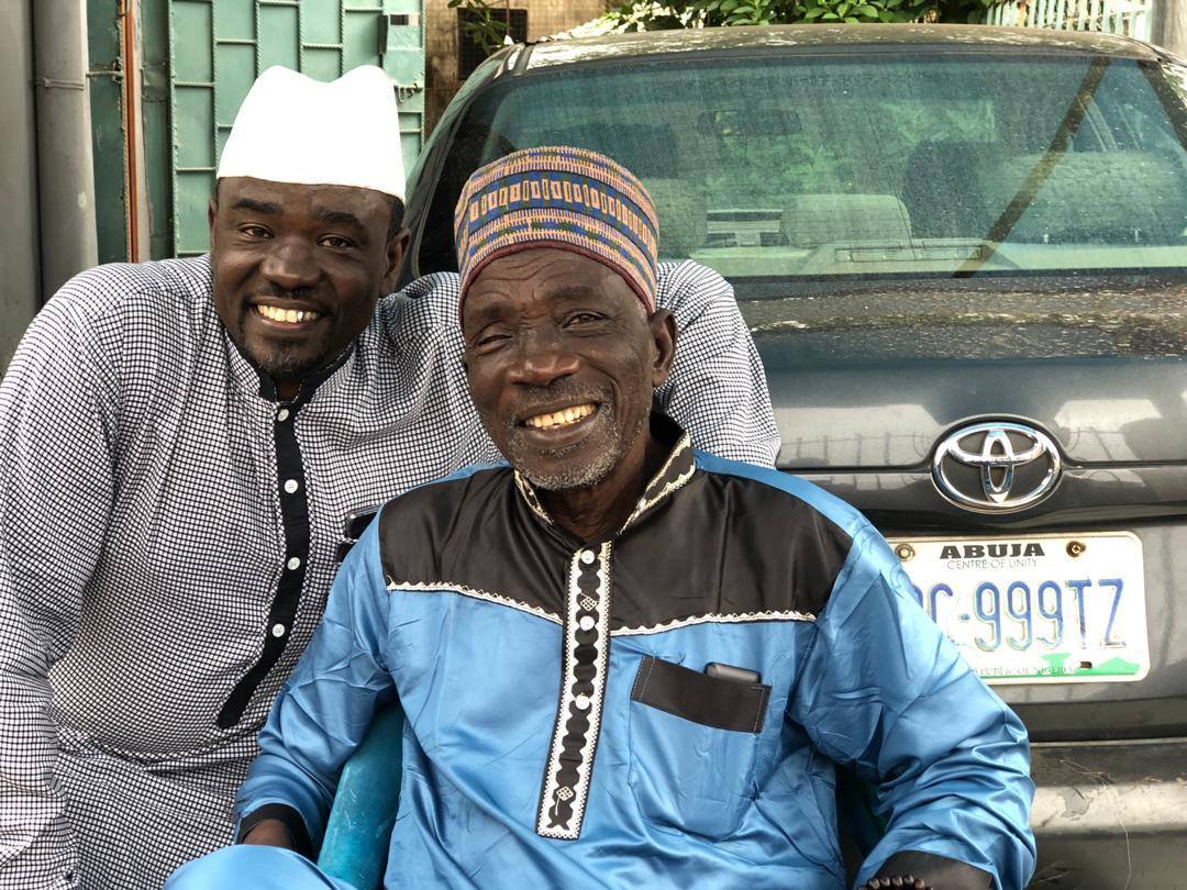 Yushau Shuaib (left) with his father, Dr Abdulhamid Agaka