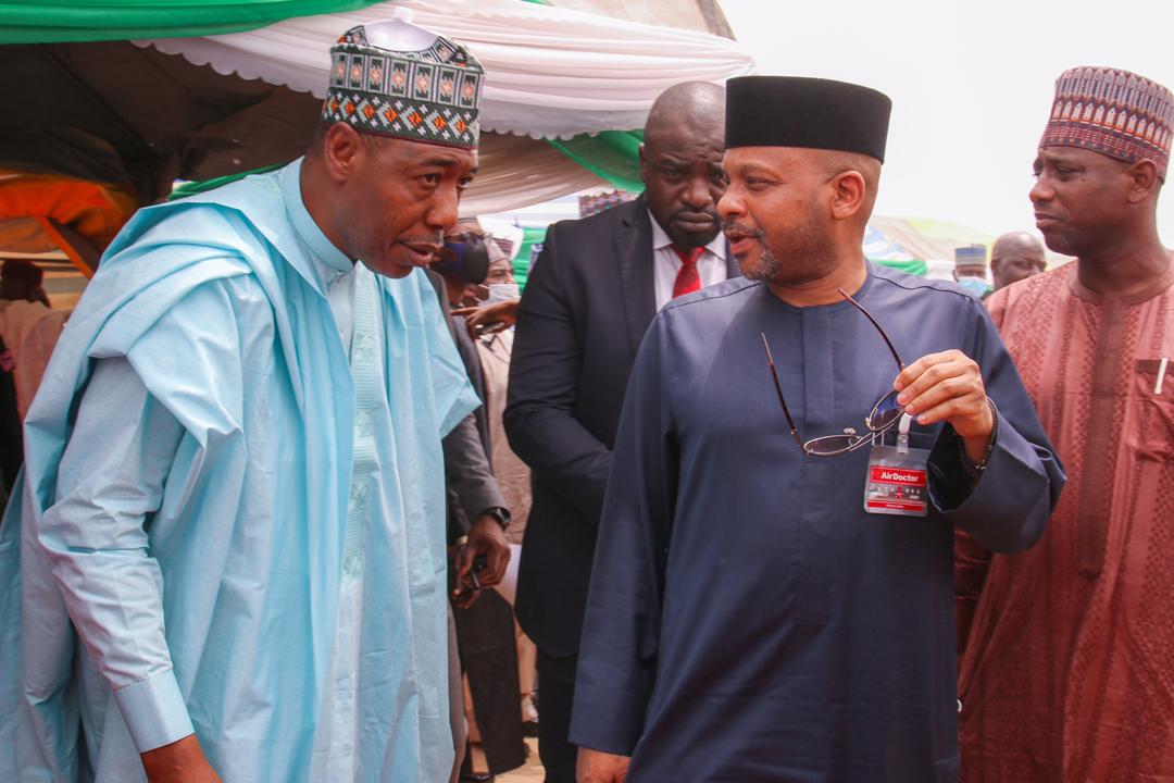 [CAPTION]: NCFRMI Federal Commissioner, Sen. Basheer Garba Mohammed, chatting with Borno State governor, Prof. Babagana Zulum during the flag-off of the verification exercise of over 350, 000 IDPs who will benefit from the agency’s Project Reliance.