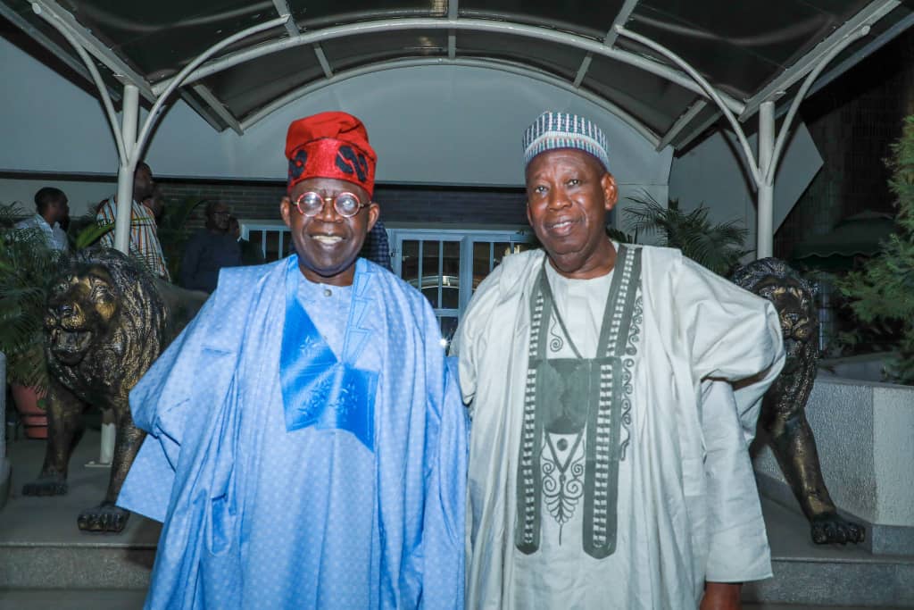 Asiwaju Bola Tinubu (left) and Governor Abdullahi Ganduje