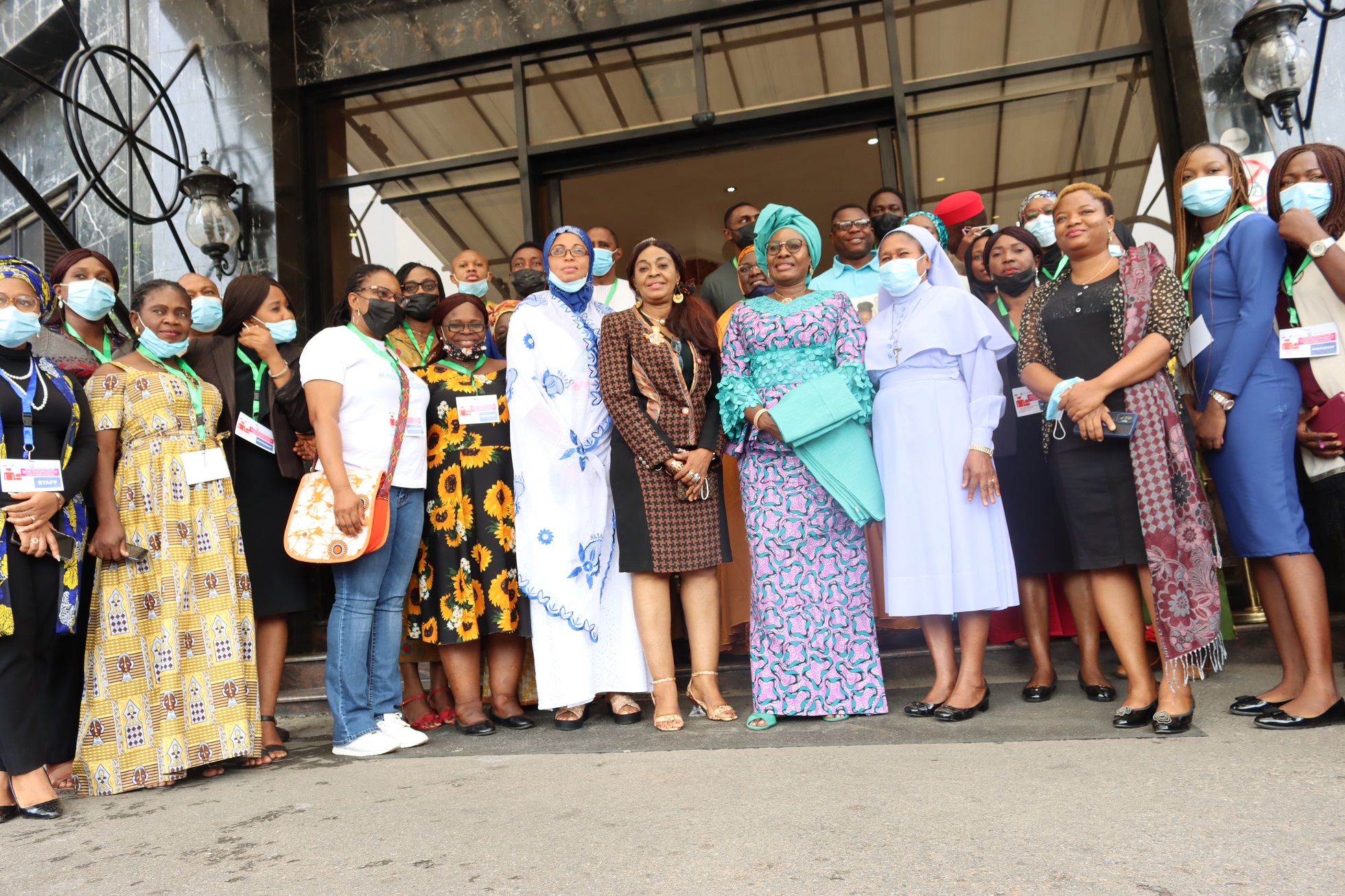Honorable Minister of Women Affairs, Mrs Pauline Tallen, in a group photograph with participants at the 1-day CSOS engagement with the Ministry to review the national strategy on ending child marriage at the Bolton White Hotel, Abuja on 15th July 2021