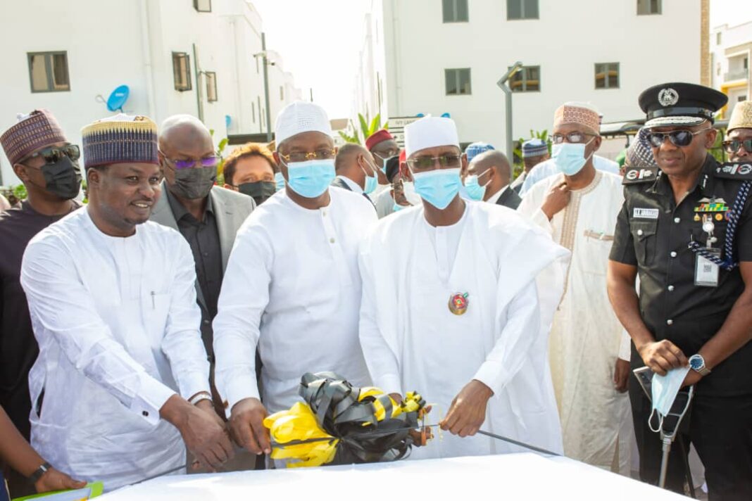 From Left: Chairman/CEO, Cosgrove Investment Limited, Mr Umar Abdullahi, the Minister of Youth and Sports, Mr Sunday Dare, Minister of the Federal Capital Territory, Mal Muhammad Musa Bello and the representative of the Inspector General of Police, AIG A. B. Abubakar during the commissioning of Cosgrove Smart Estate, Wuye, Abuja, recently.