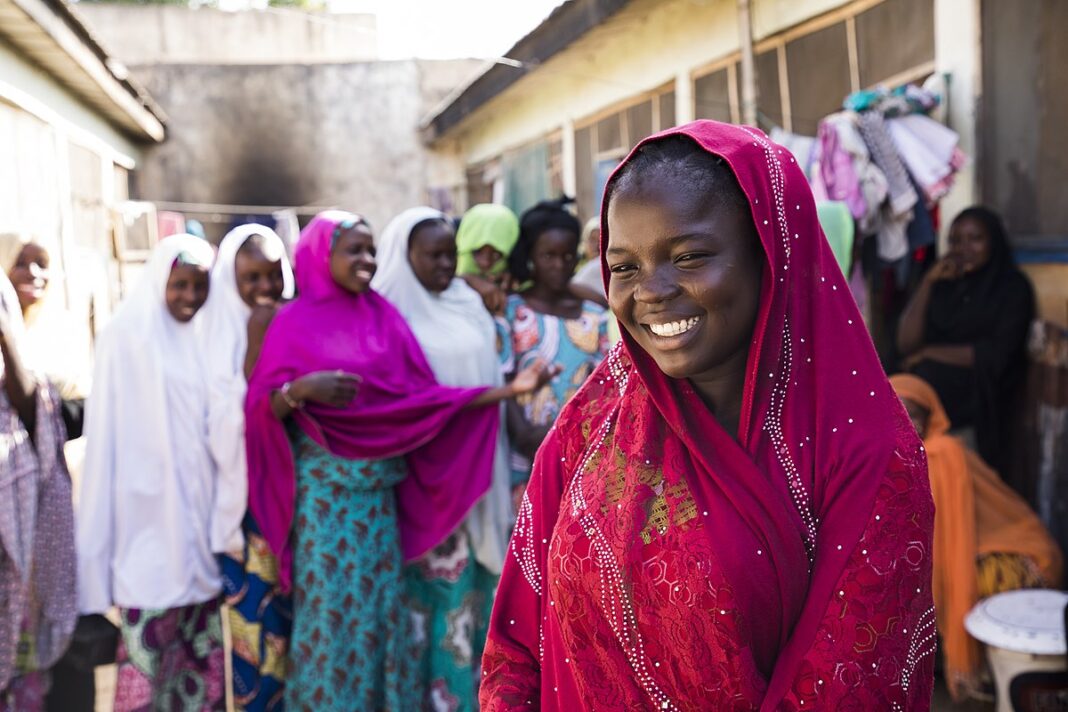 Maiduguri, Nigeria ECR project SEL USAID IDP Aisha pictured with her friends in her neighborhood