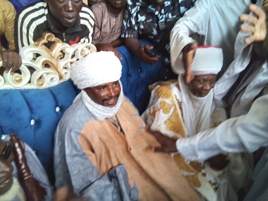 Terror kingpin Ado Aliero (left) with the Emir of 'Yandoton Birni, Alhaji Aliyu Marafa, after the former's turbaning as Sarkin Fulani on Saturday July 17, 2022.