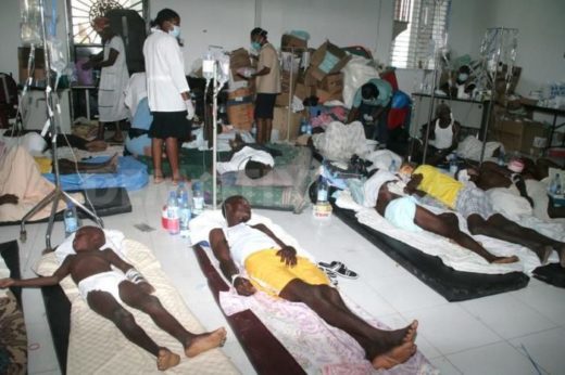 FILE PHOTO: Patients on hospital beds after cholera outbreak