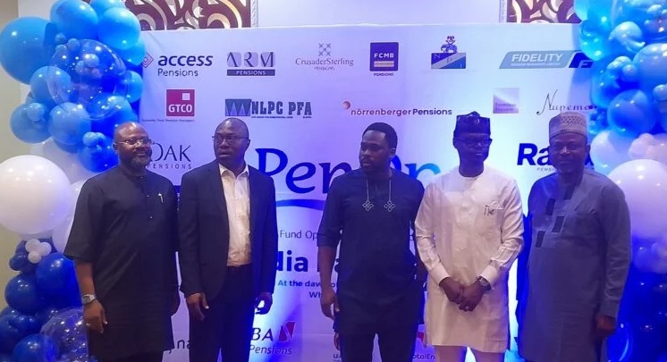 Officials of PenOp and PenCom at the 2023 PenOp media parley on Friday in Lagos