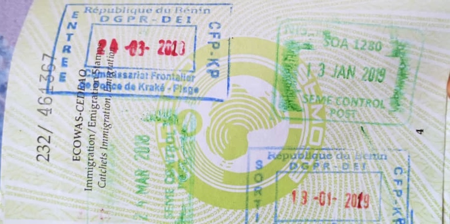 A page in the reporter's passport, showing exit and entry stamps both Nigerian and Beninois immigrations.