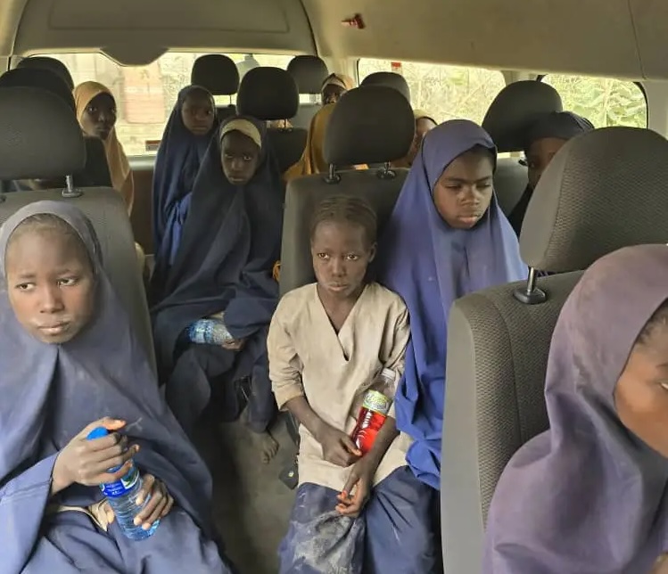 Released schoolchildren being transported back home.