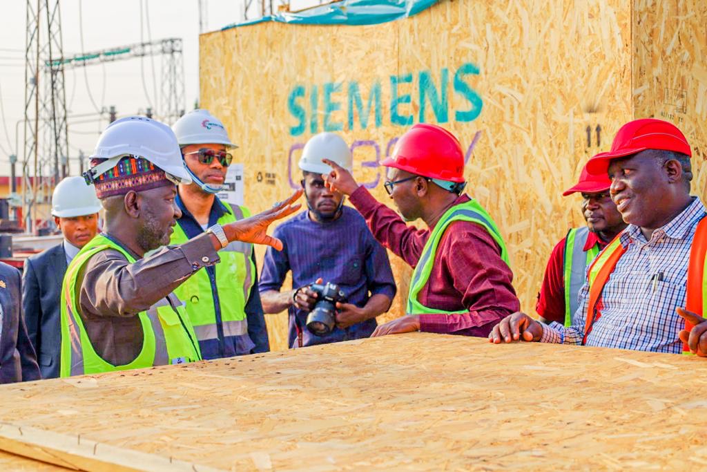 The former minister inspecting some of the transformers after delivery in Nigeria