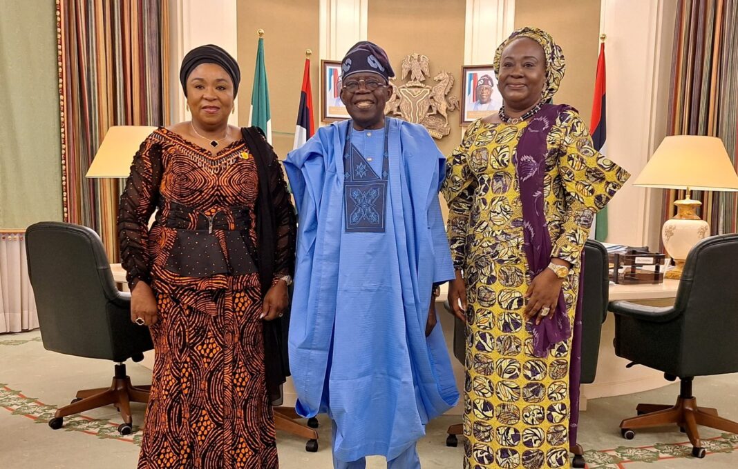 Outgoing Folasade Esan presents successor Esther Wilson-Jack to President Tinubu