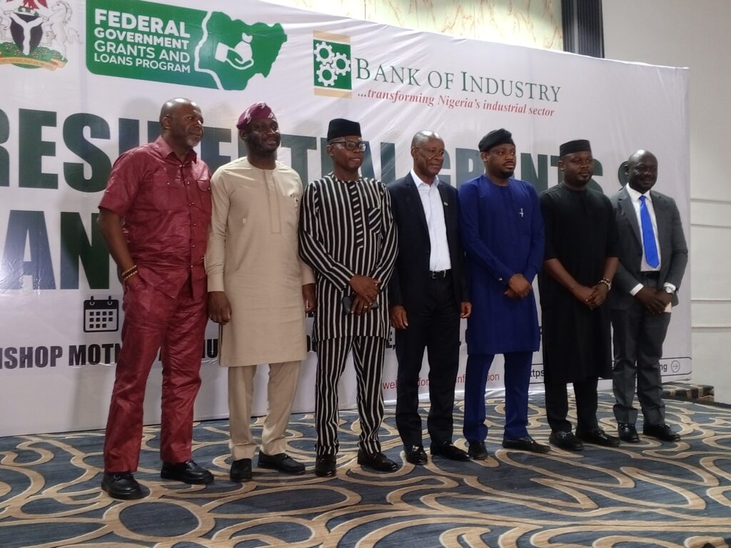 Fourth from left, Min. of State for Industry Trade and Investment Sen. John Owan-Enoh flanked by other dignitaries at the Presidential Loan and Grant Scheme Town Hall Meeting in Calabar